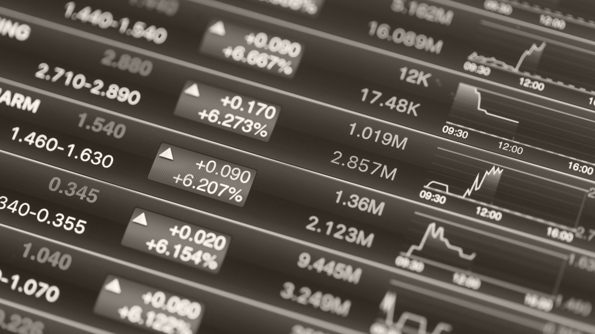 Stock market dashboard with numbers, arrows, and small line charts representing trading data.